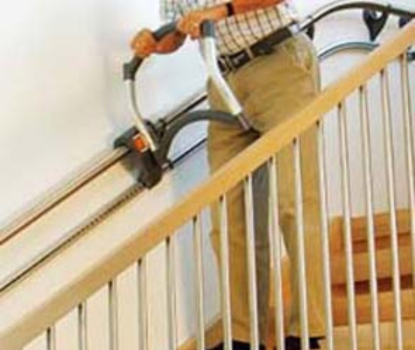 Stair climbing assist rail system